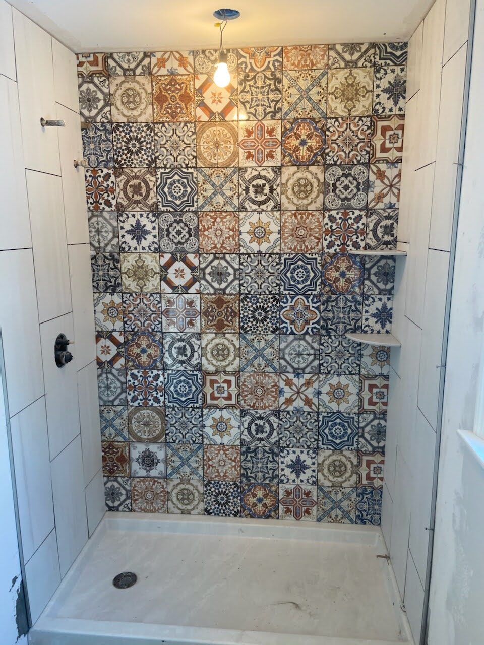Porcelain and ceramic tile options on a showroom display board