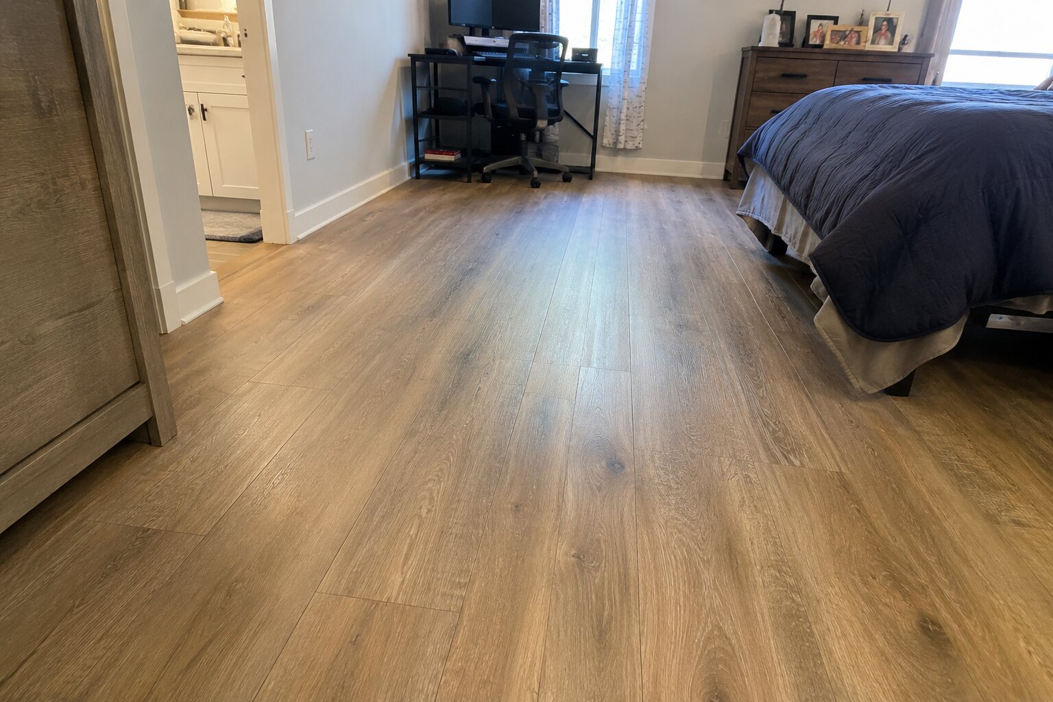 Light luxury vinyl plank flooring installed in a kitchen